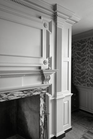 Reconstructed chimney and woodwork in the parlor